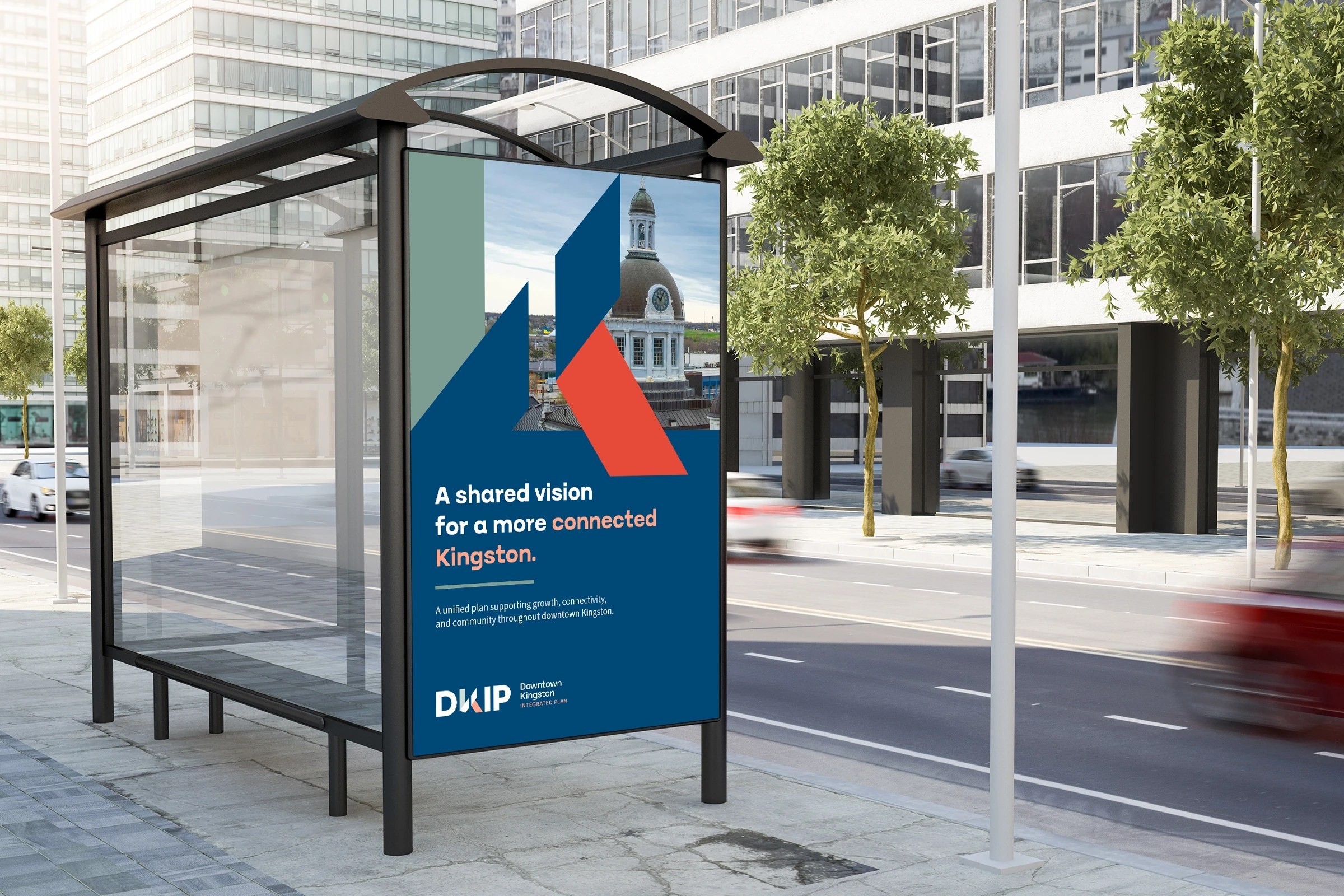 Downtown Kingston Integrated Plan poster at a bus shelter